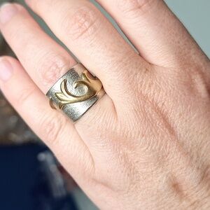 Elegant Silver and Gold Swirl Ring